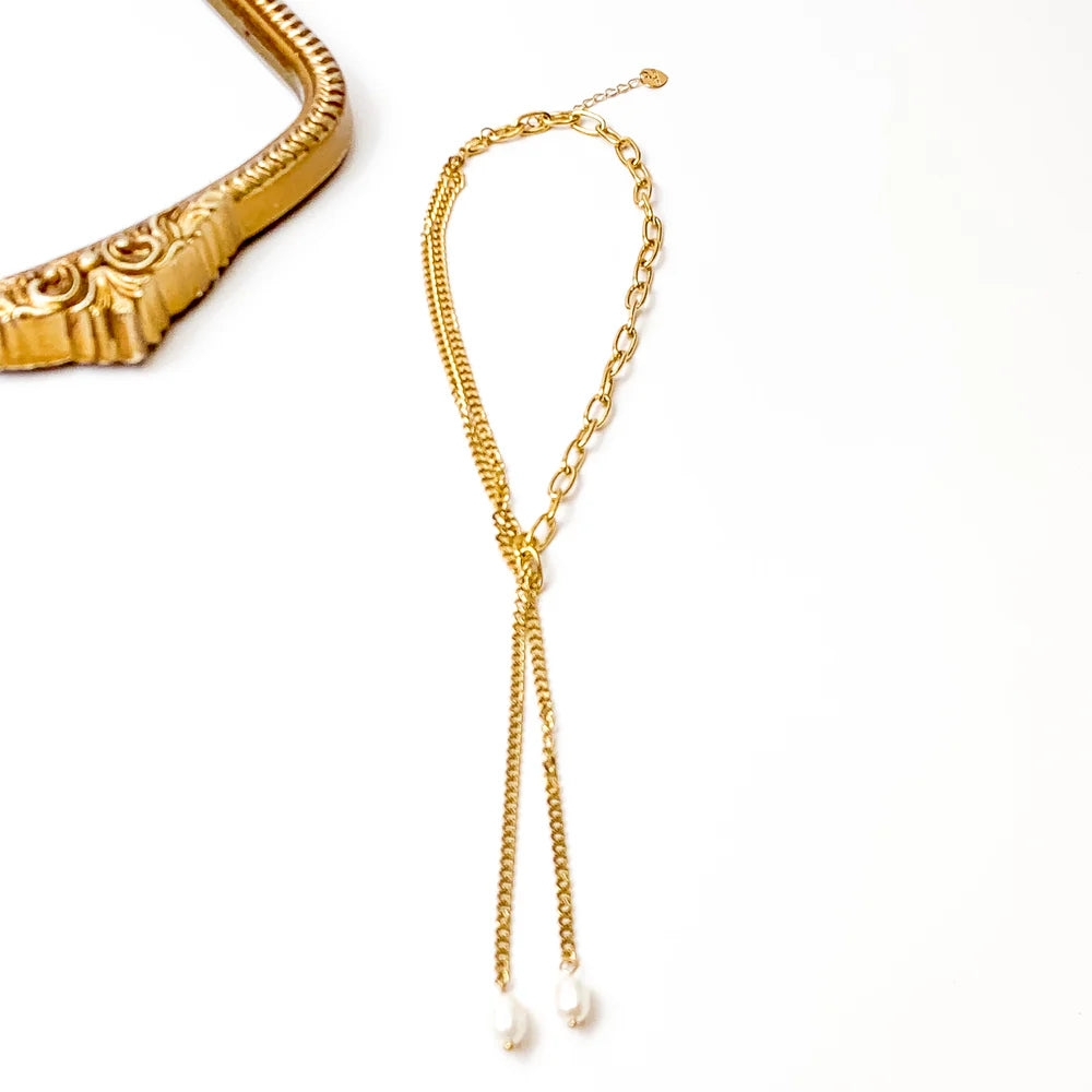 
                      
                        Ellery Gold Pearl Necklace
                      
                    