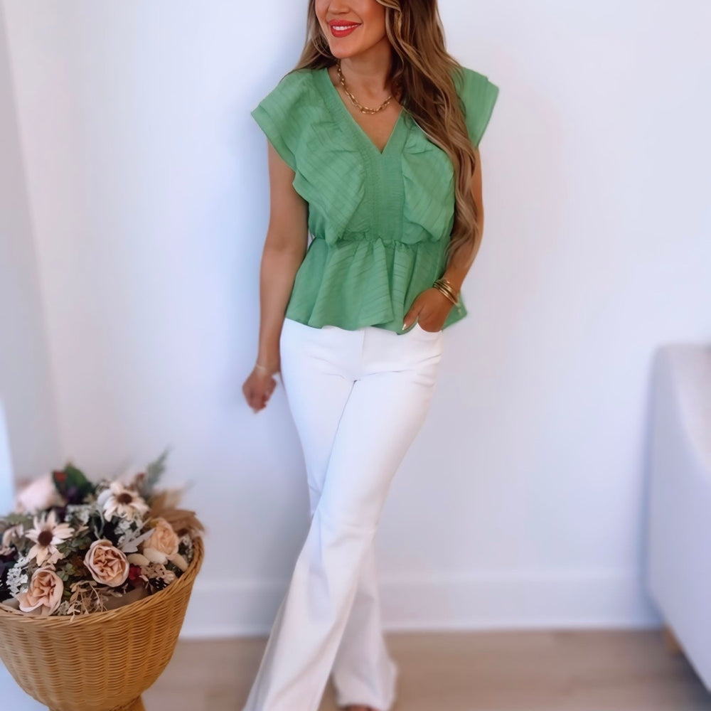 
                      
                        A Little Extra Ruffle Peplum Top
                      
                    