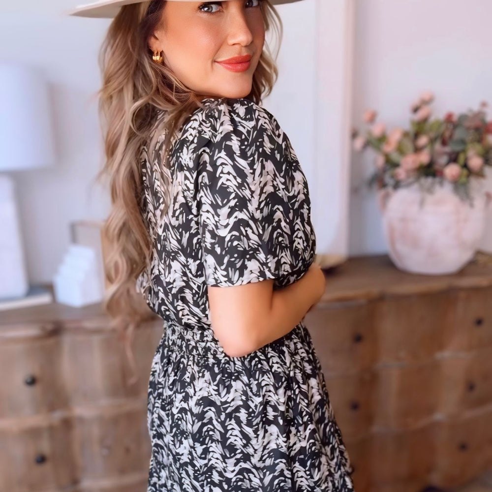 
                      
                        Gigi Short Sleeve Midi Dress
                      
                    