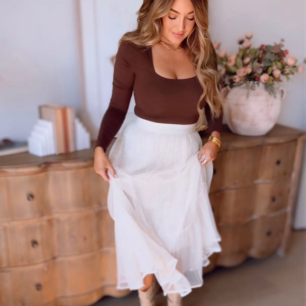 
                      
                        Velvet Shimmer Midi Skirt
                      
                    