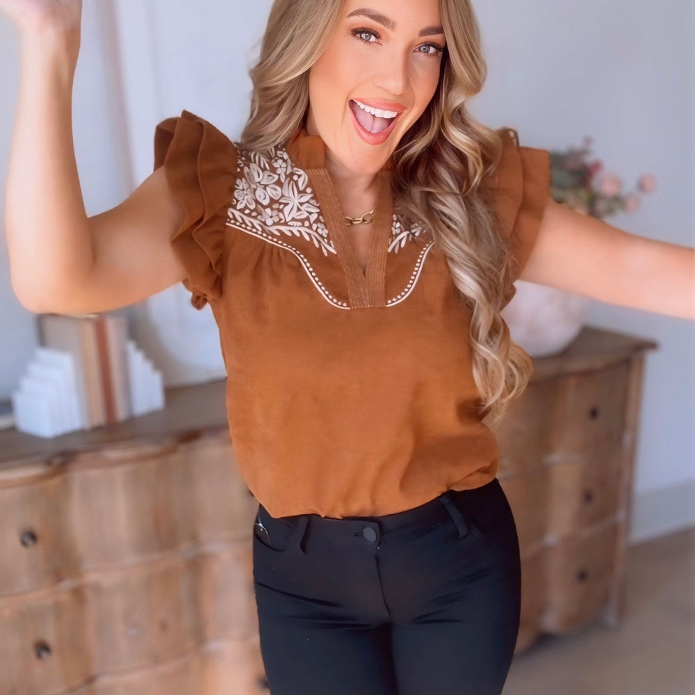 
                      
                        Devyn Flutter Sleeve Embroidered Top
                      
                    
