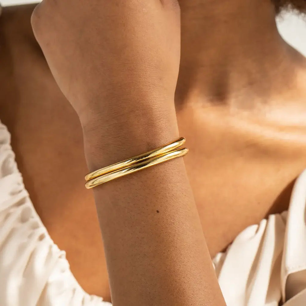 
                      
                        Twin Gold Bangles
                      
                    