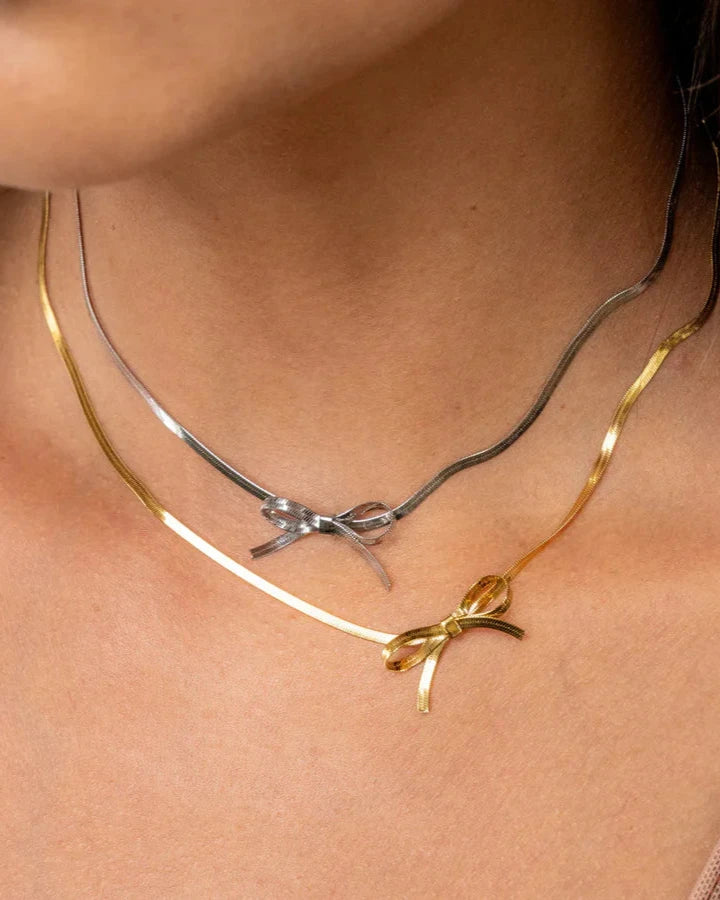 
                      
                        Elegant Bow Necklace
                      
                    